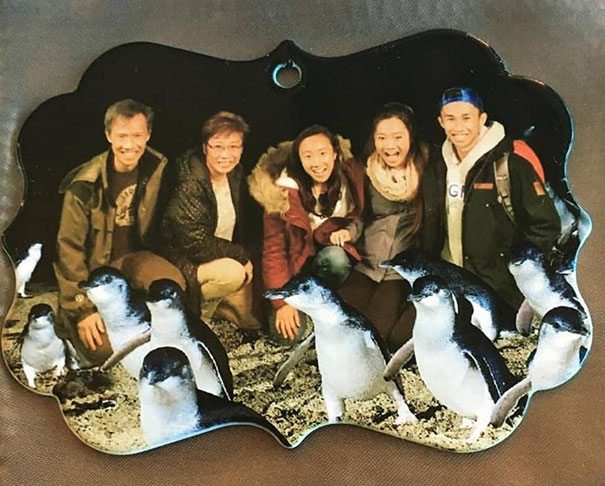 'Ordered a custom family photo ornament. Received one with a random Asian family and Photoshopped added penguins. Not even mad.'