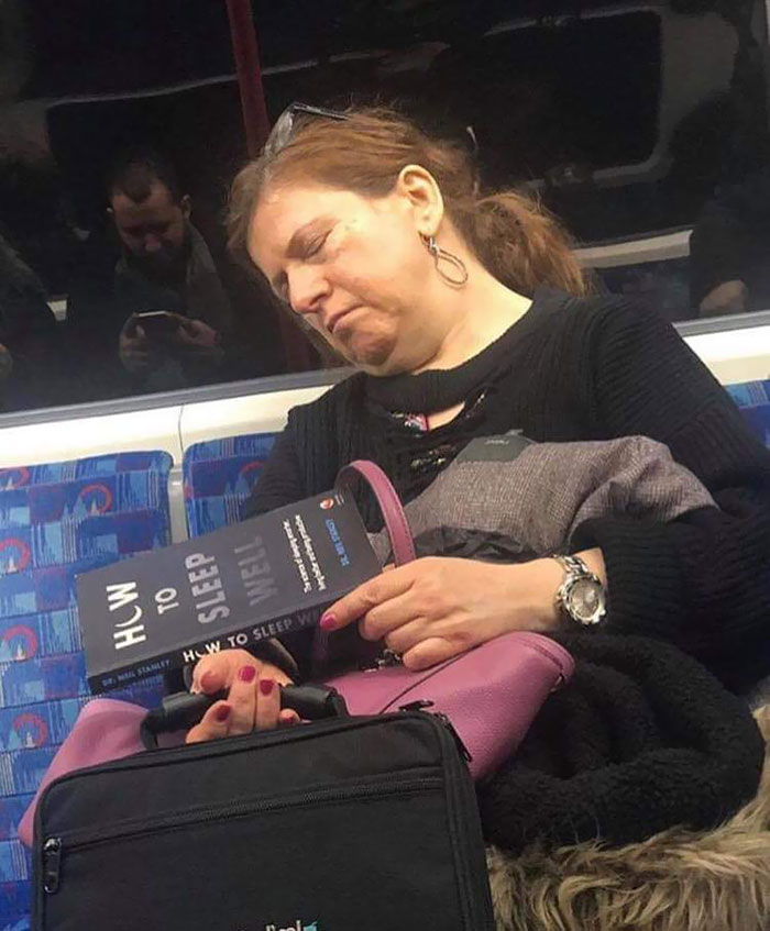 woman sleeping in metro